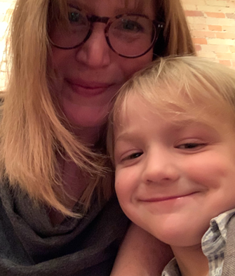 Professor T. Nikki Cesare Schotzko with her son