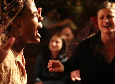 Graziele Sena and Felicita Marcelli singing.