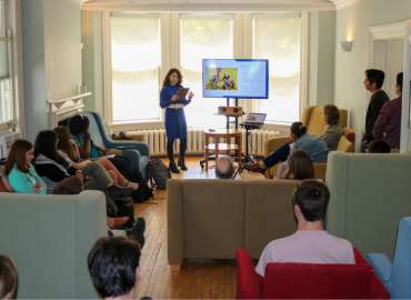 Master&amp;#039;s student presenting her thesis in Front and Long Rooms